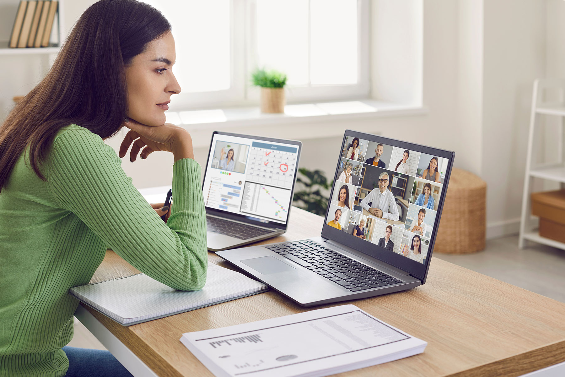 person participating in virtual group therapy on laptop from comfort of home