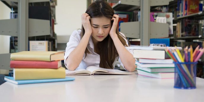 student at table