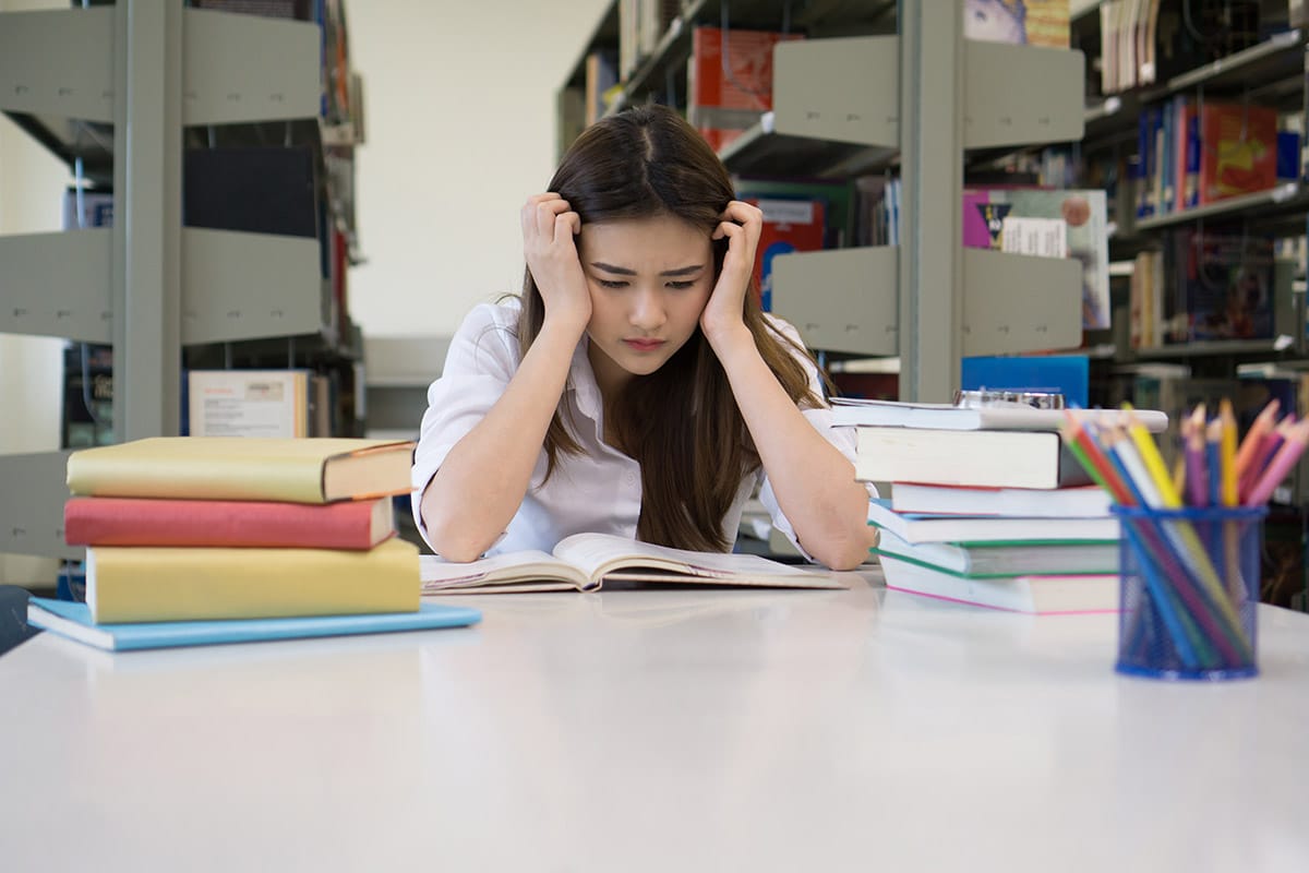 student at table