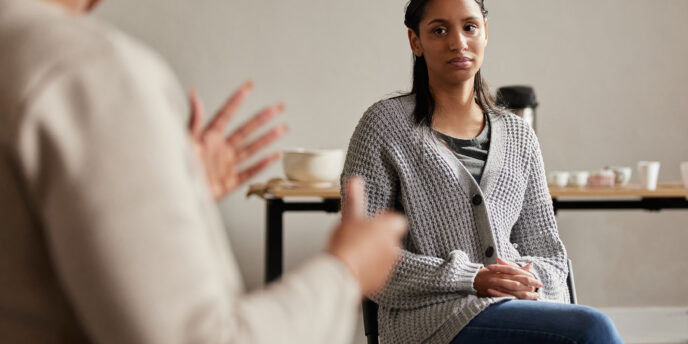 Woman learning about alcohol-induced psychosis