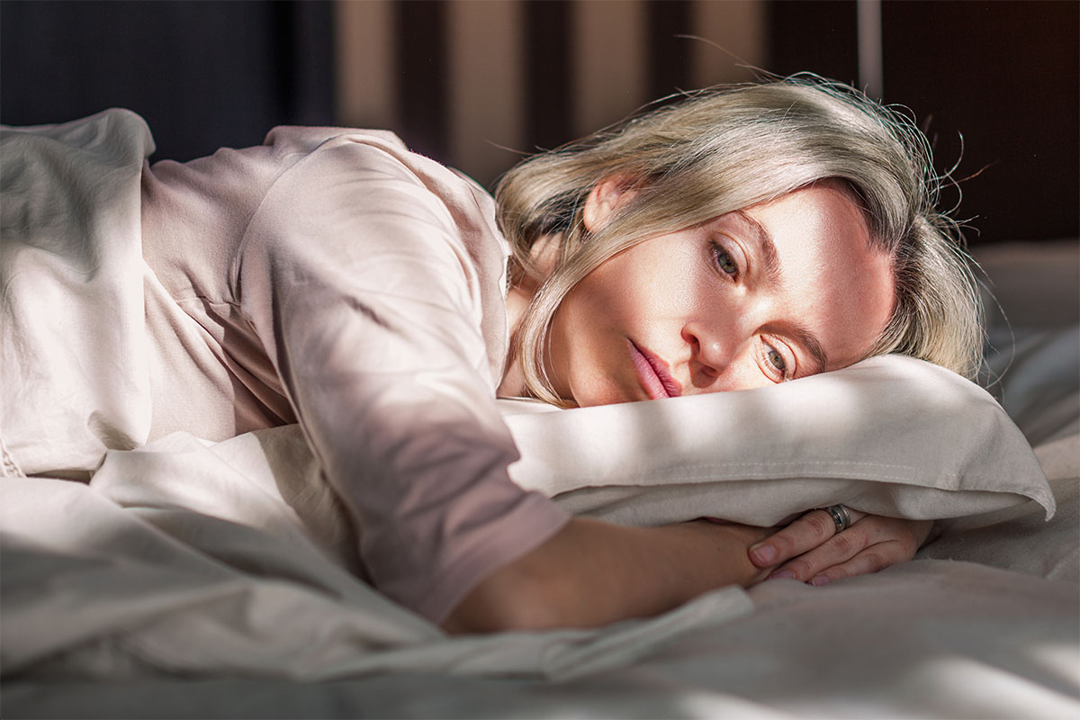 person in bed wondering about what are most addictive painkillers