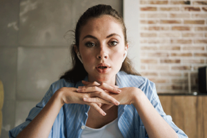 person with hands folded experiencing precipitated withdrawal