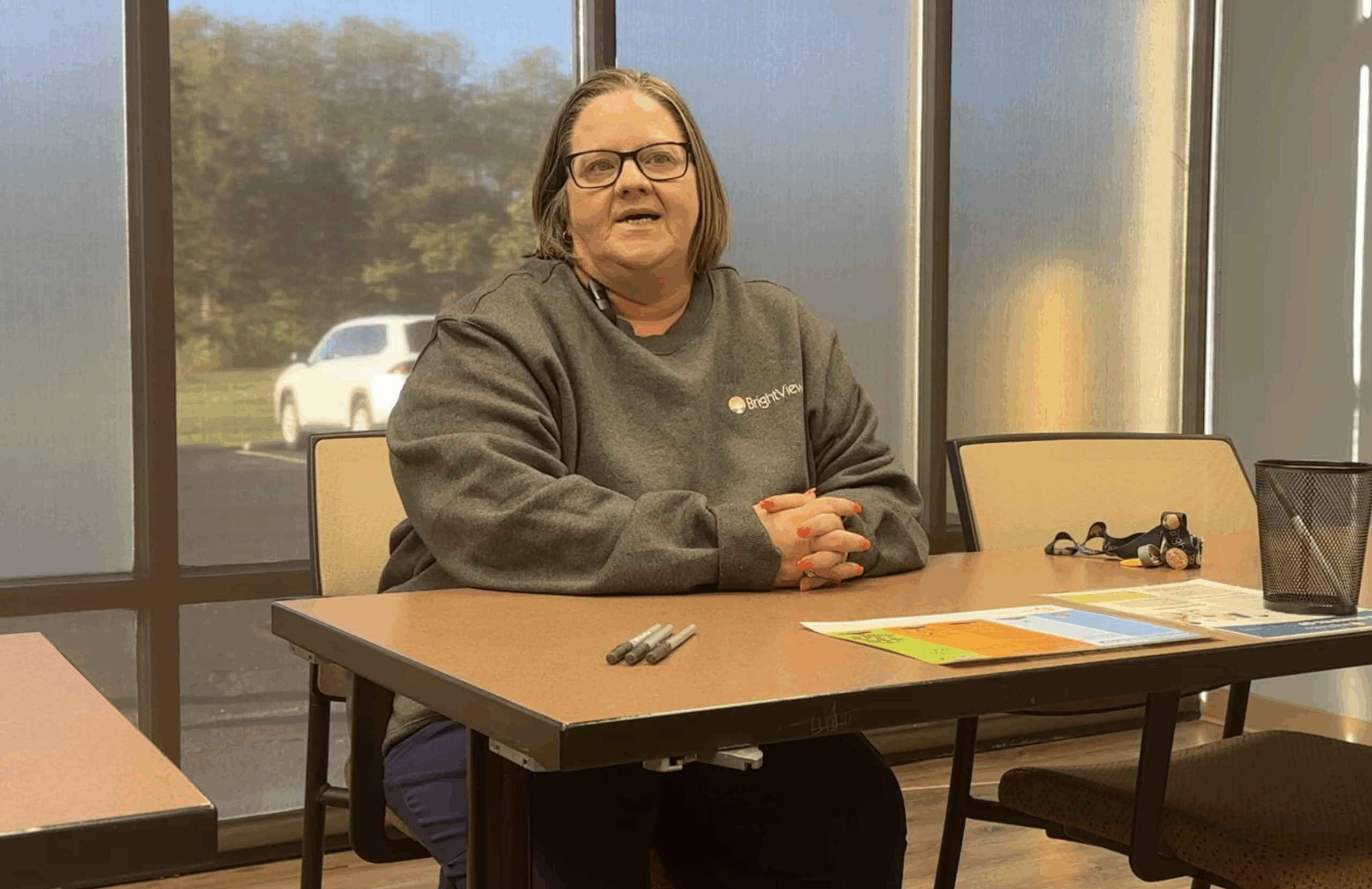 Marissa, a BrightView employee in recovery, sharing her story of survival and hope during an interview.